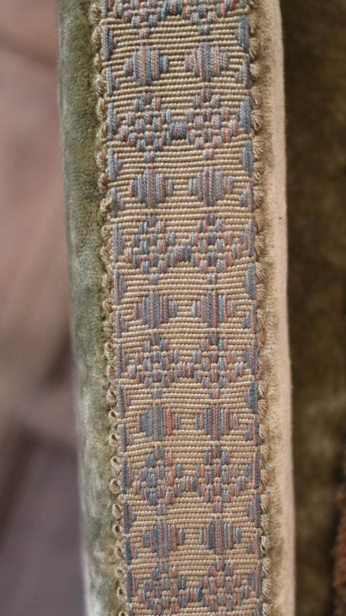 An early-20th century, Knole settee with a verdure tapestry fragment incorporated into the back