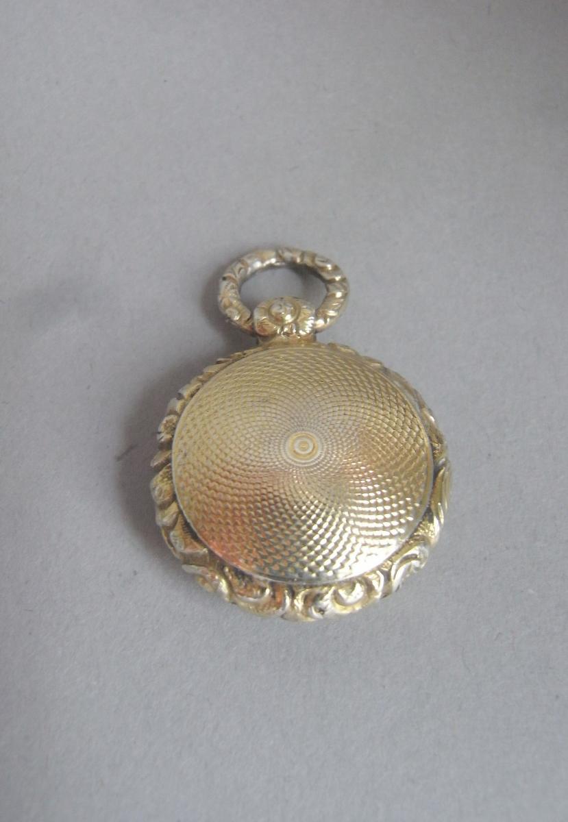 A William IV silver gilt Vinaigrette of unusually small size, probably for a child. Made in Birmingham in 1831 by Thomas Shaw