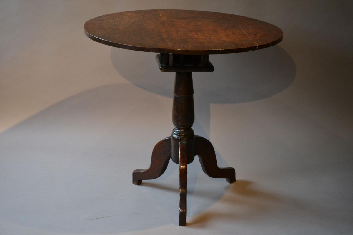 A George II oak pedestal tavern table