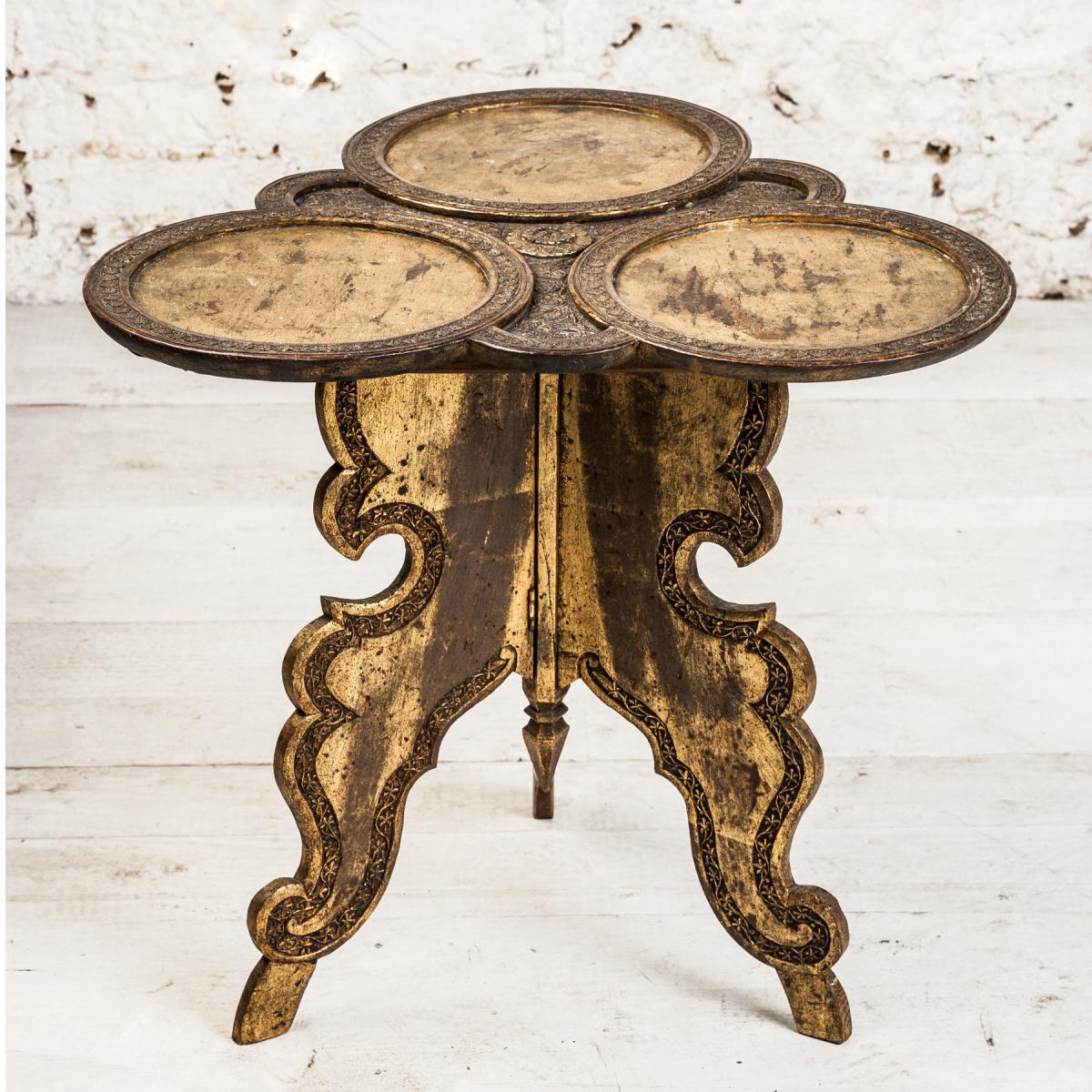 gilded blackwood table
