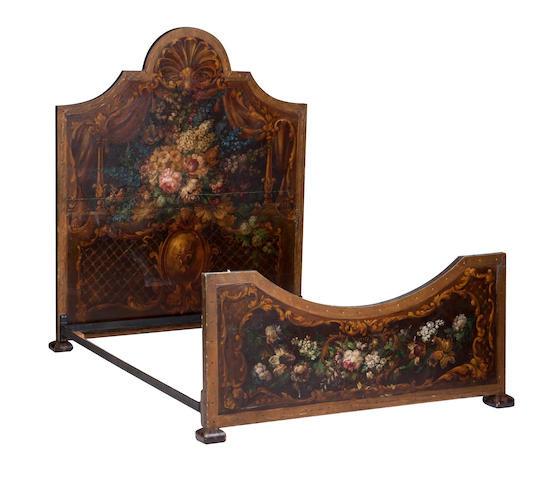 An early-20th century painted double bed