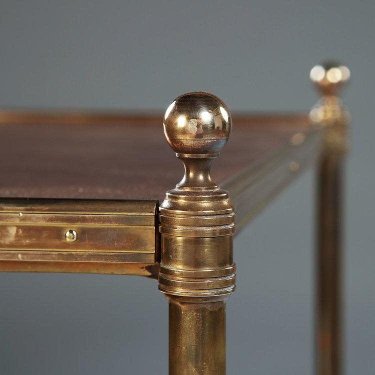 A Pair of Mahograny and Brass Three Tier Etageres