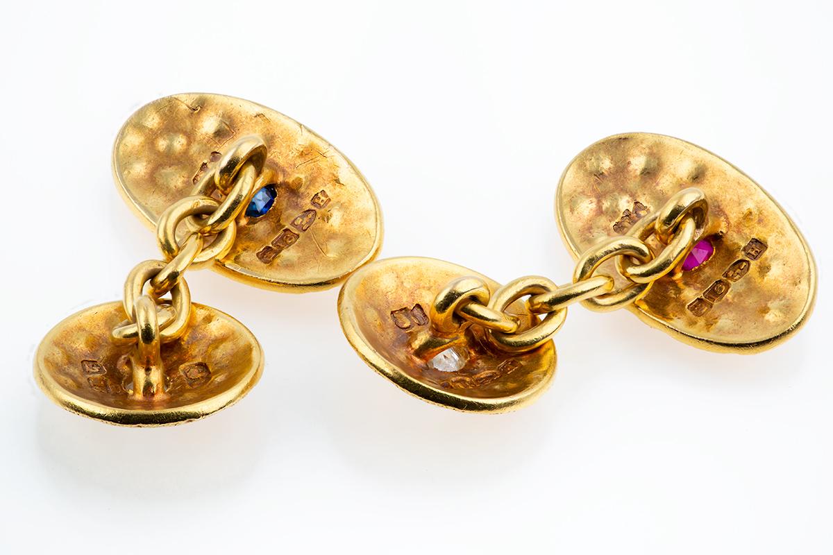 Antique Cufflinks in 18 Carat Gold with Stippled Design, Diamonds, Sapphire and Ruby, English dated 1891
