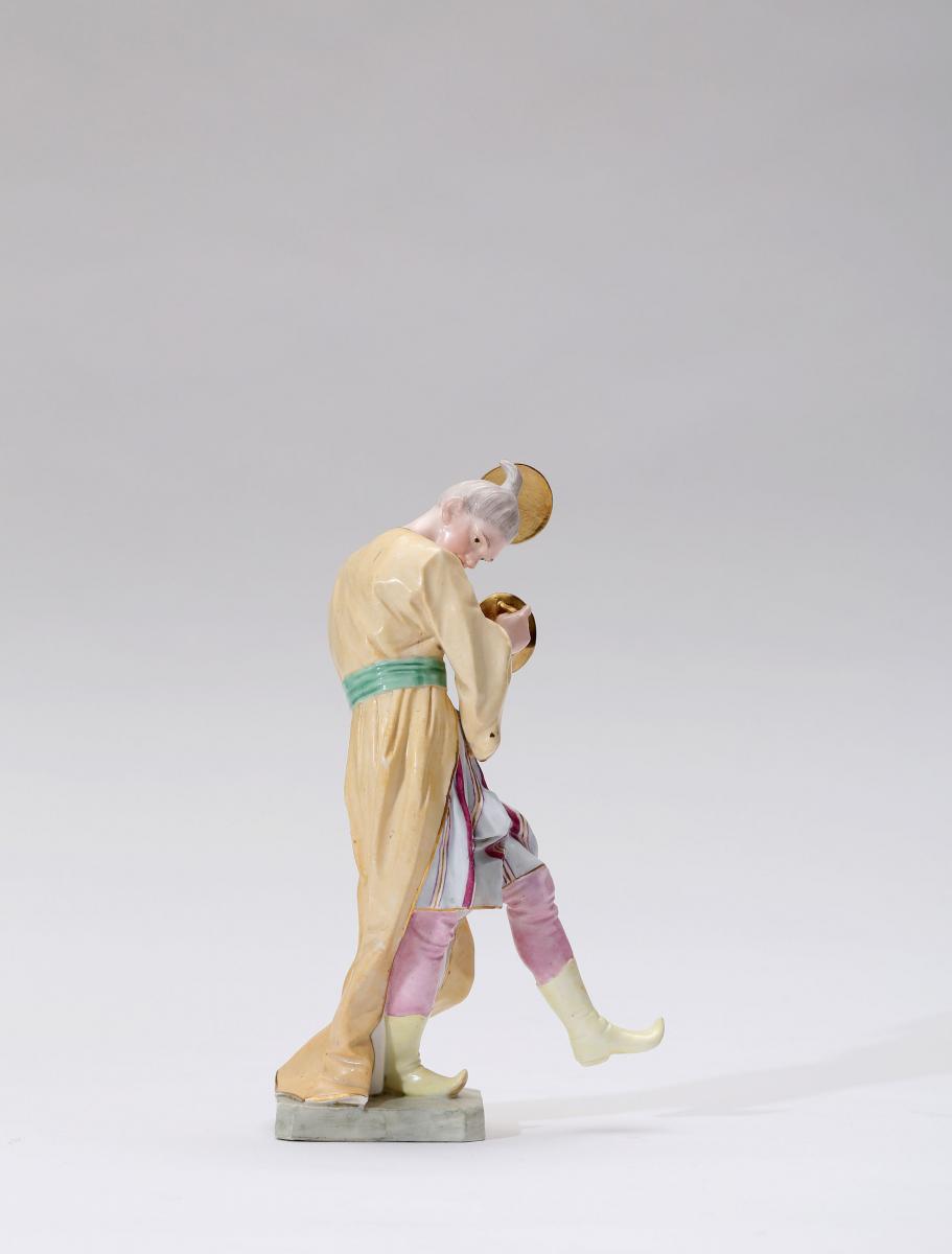 A Höchst Porcelain Figure of a Chinese Musician Playing the Cymbals, Modelled by Johann Peter Melchior