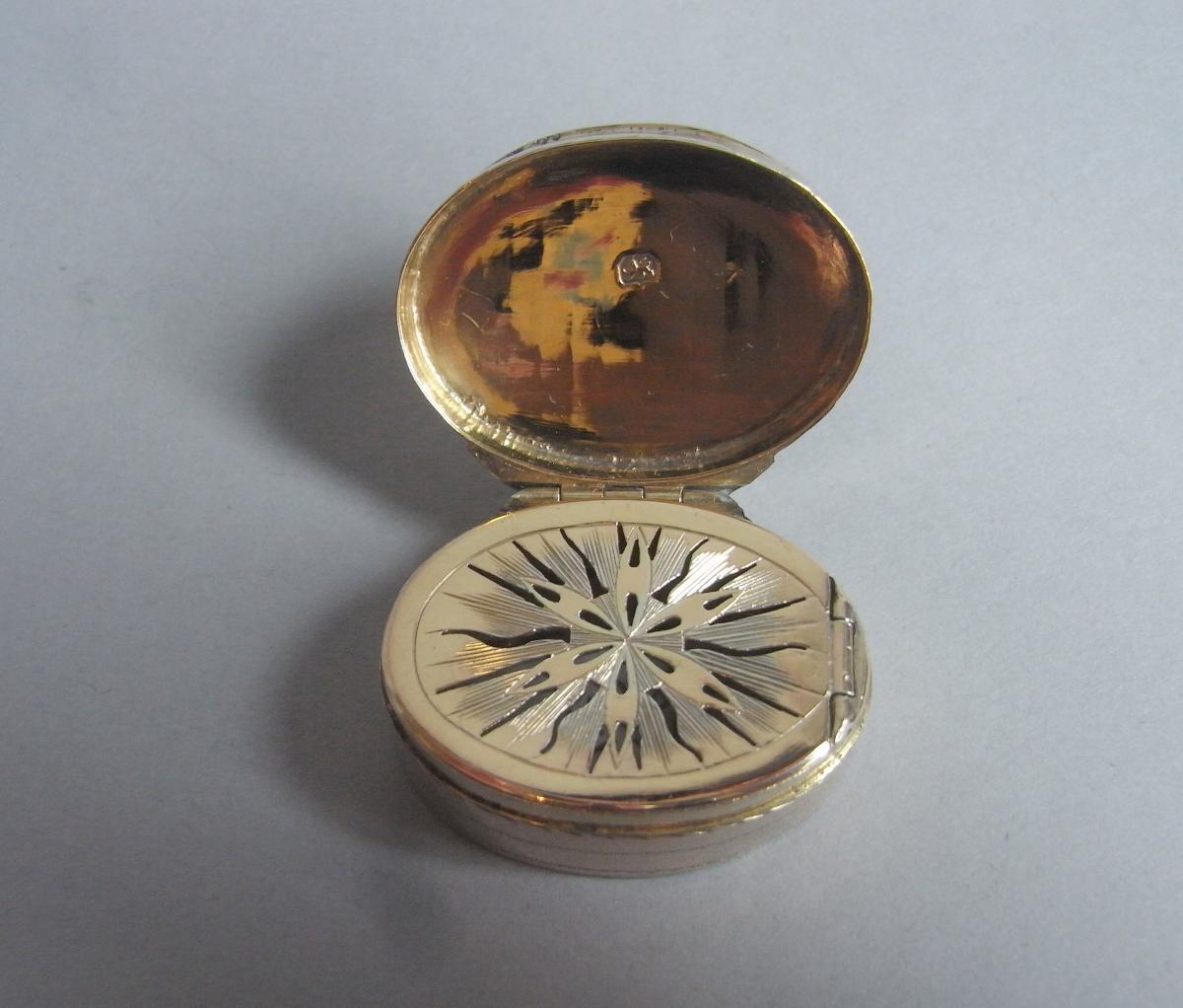A very fine George III silver gilt oval Vinaigrette made in London in 1800 by Lockwood & Douglas