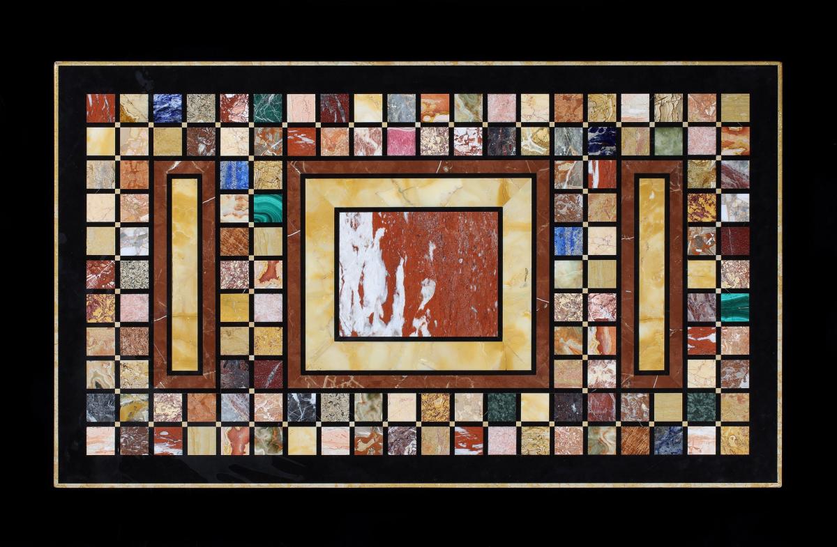 Specimen marble pietre dura top united with a metal table base in the manner of Marcel Coard