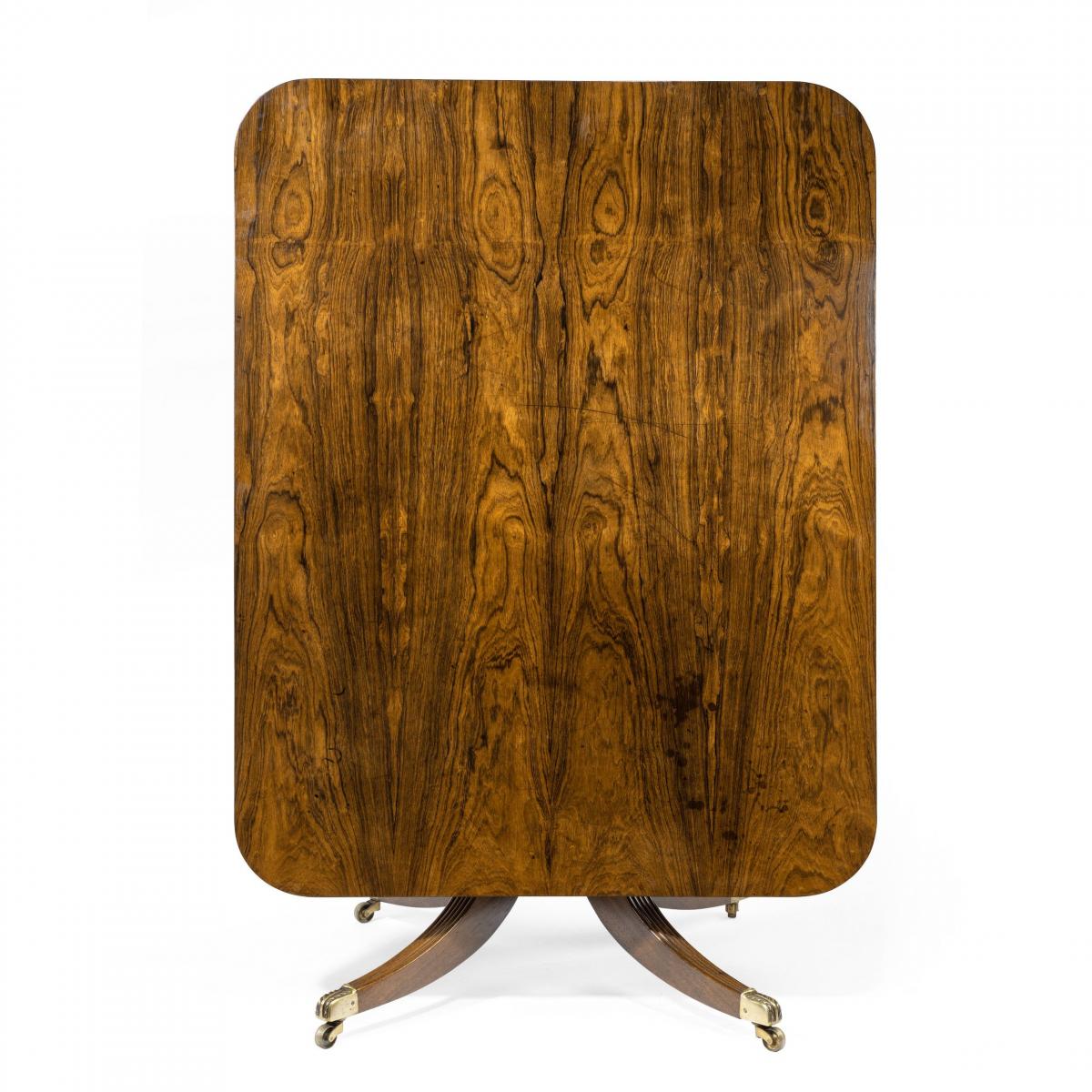 A Regency rectangular rosewood tilt-top table attributed to Gillows