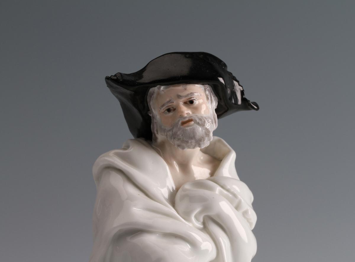 A Chelsea figure of an Italian Beggar; modelled by Joseph Willems