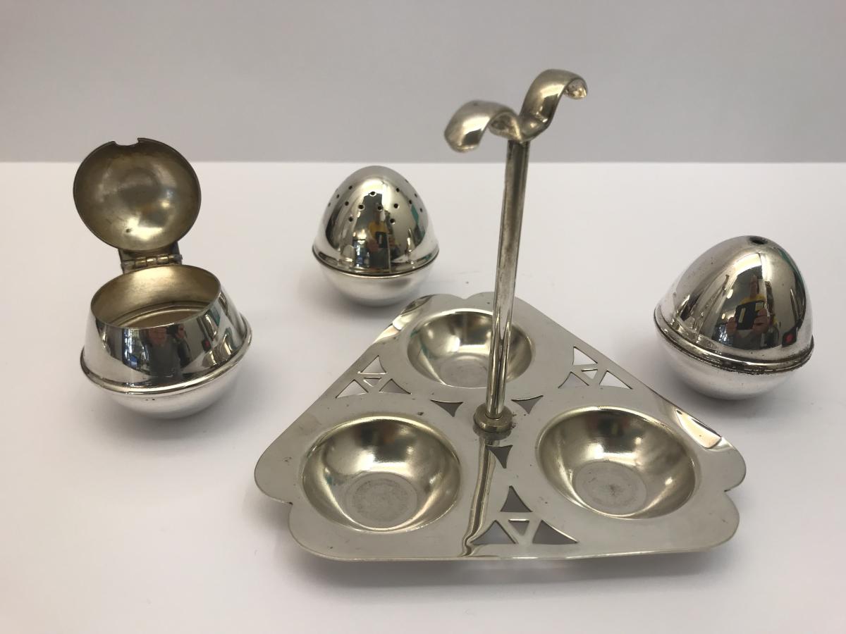 Antique Silver plated condiment set comprising of a salt a pepper and a mustard pot