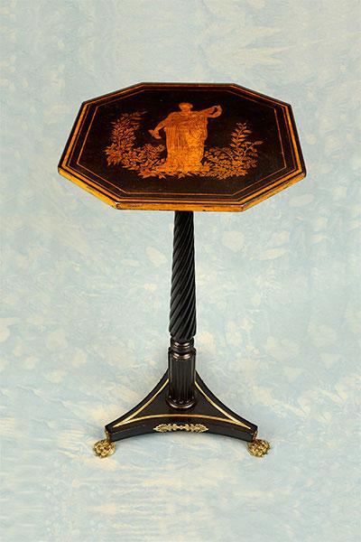 An exceptional and rare penwork tilt top table