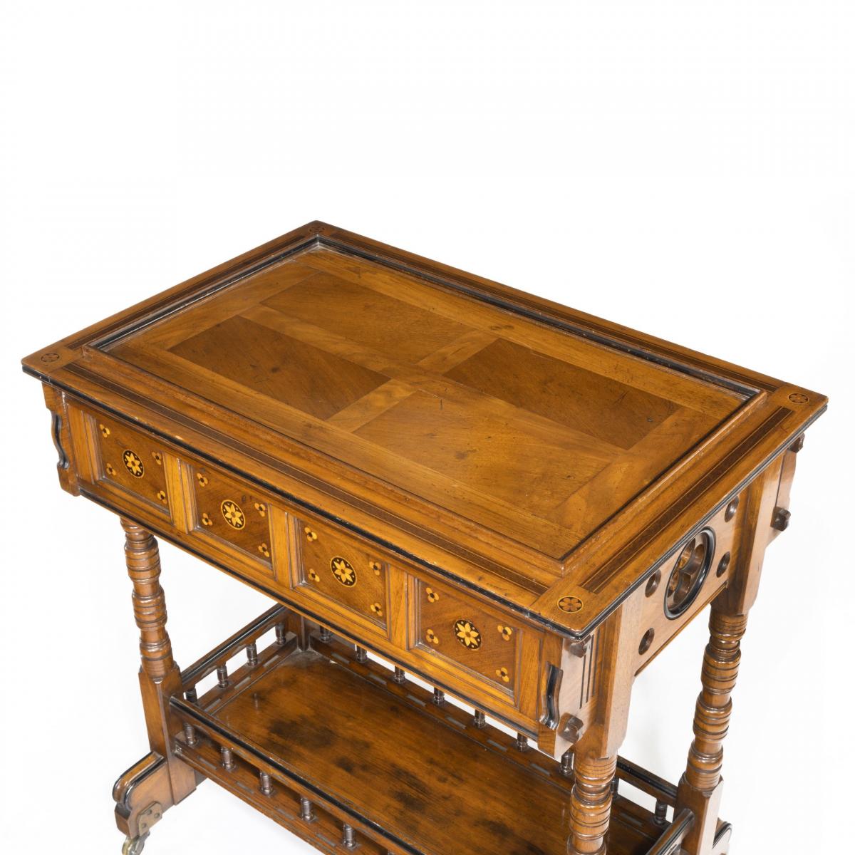A walnut side table/jardinière by Gillows probably after Augustus Pugin