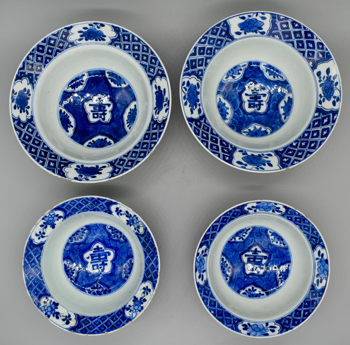 A set of 4 Kangxi blue and white Shou bowls