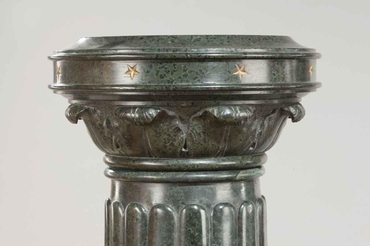 An unusual pair of Victorian marble revolving topped pedestals