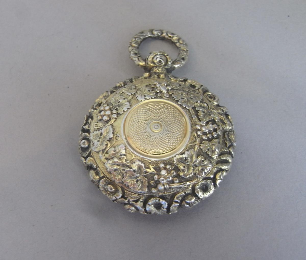 An exceptionally fine George III cast silver gilt Vinaigrette, modelled as a Fob Watch, made in Birmingham in 1818 by Samuel Pemberton