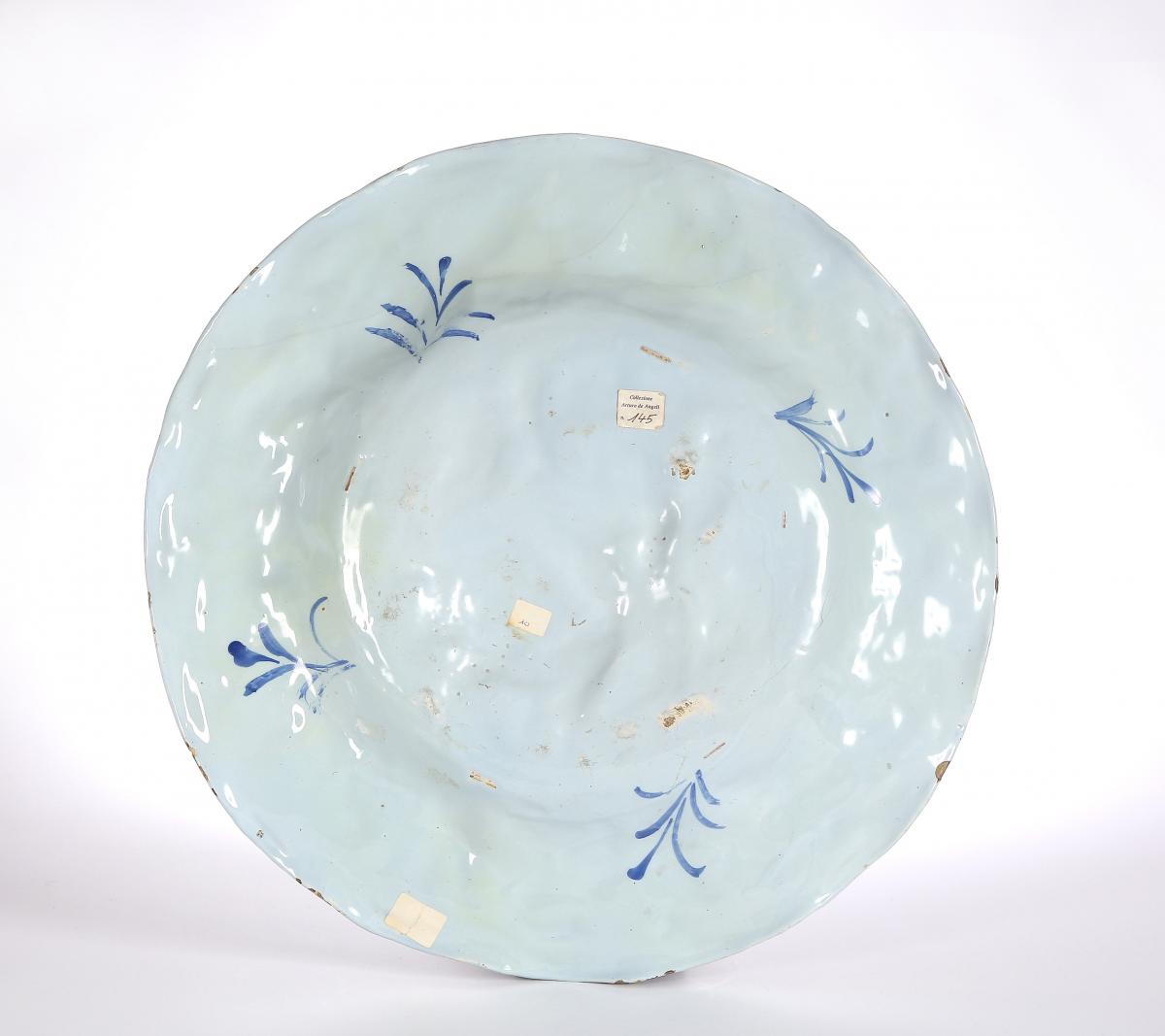 A Large Pavia Faience Charger