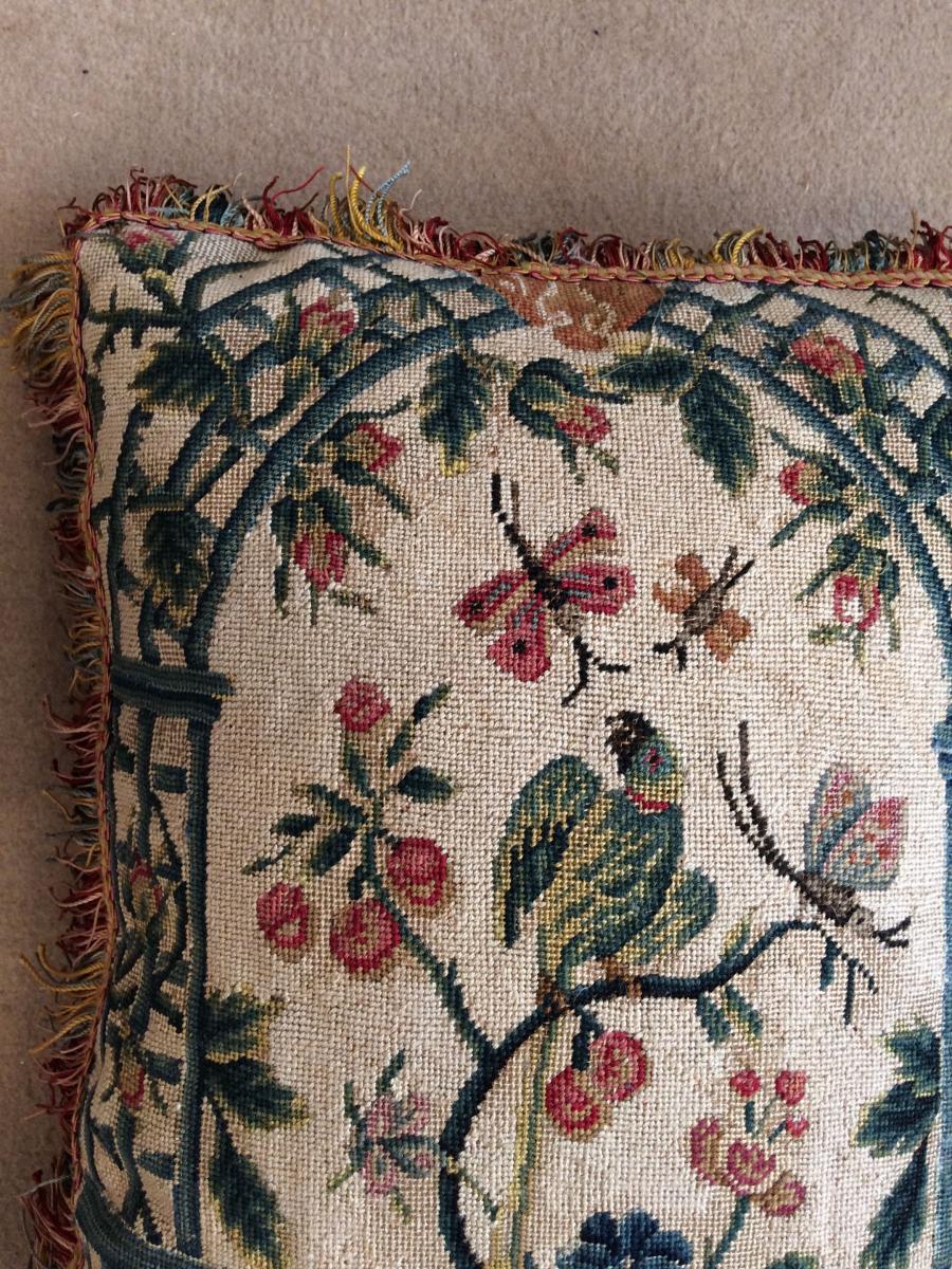 A Cushion of Late 18th Century French Needlework With a Green Parakeet