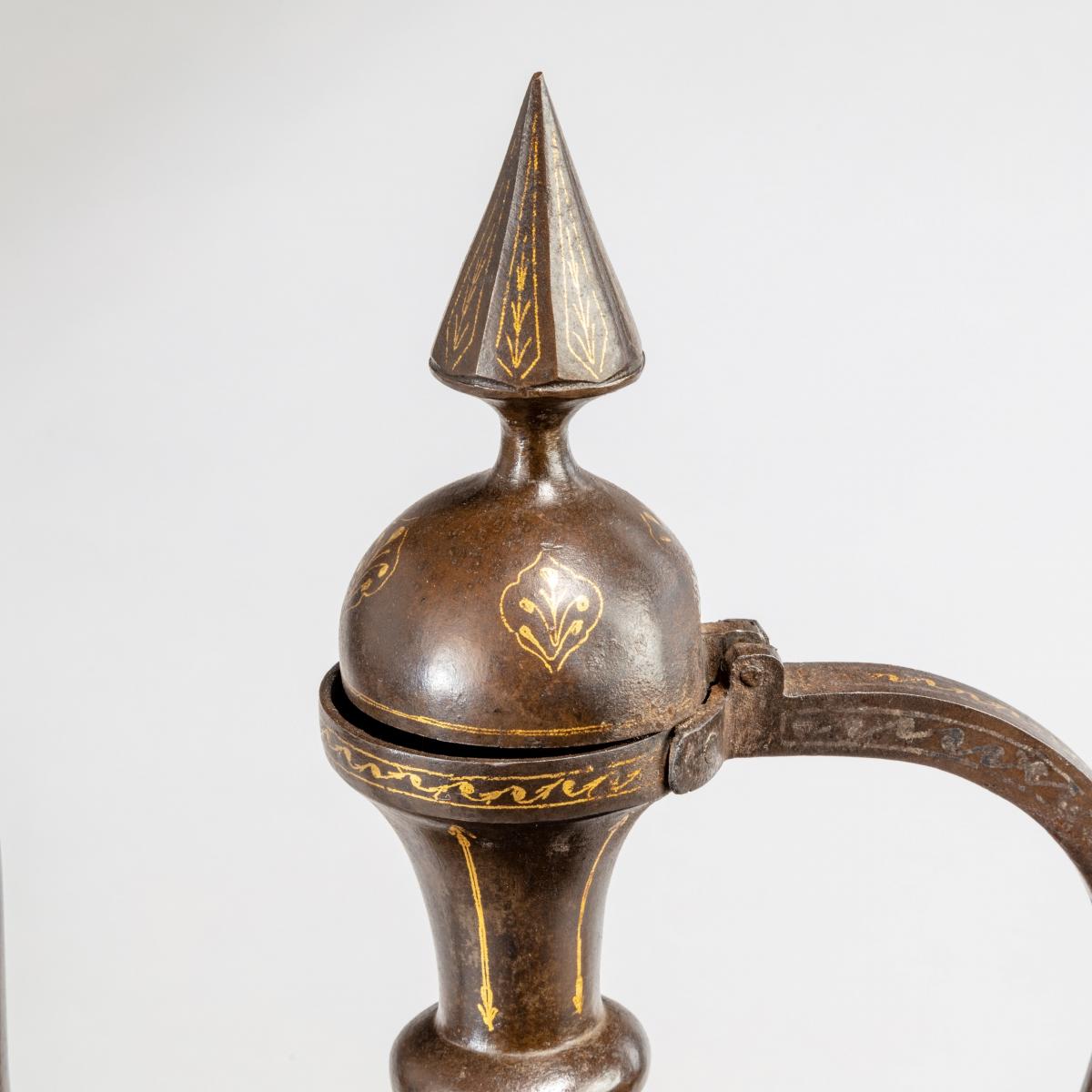 A Qajar gold-damascened steel ewer and basin