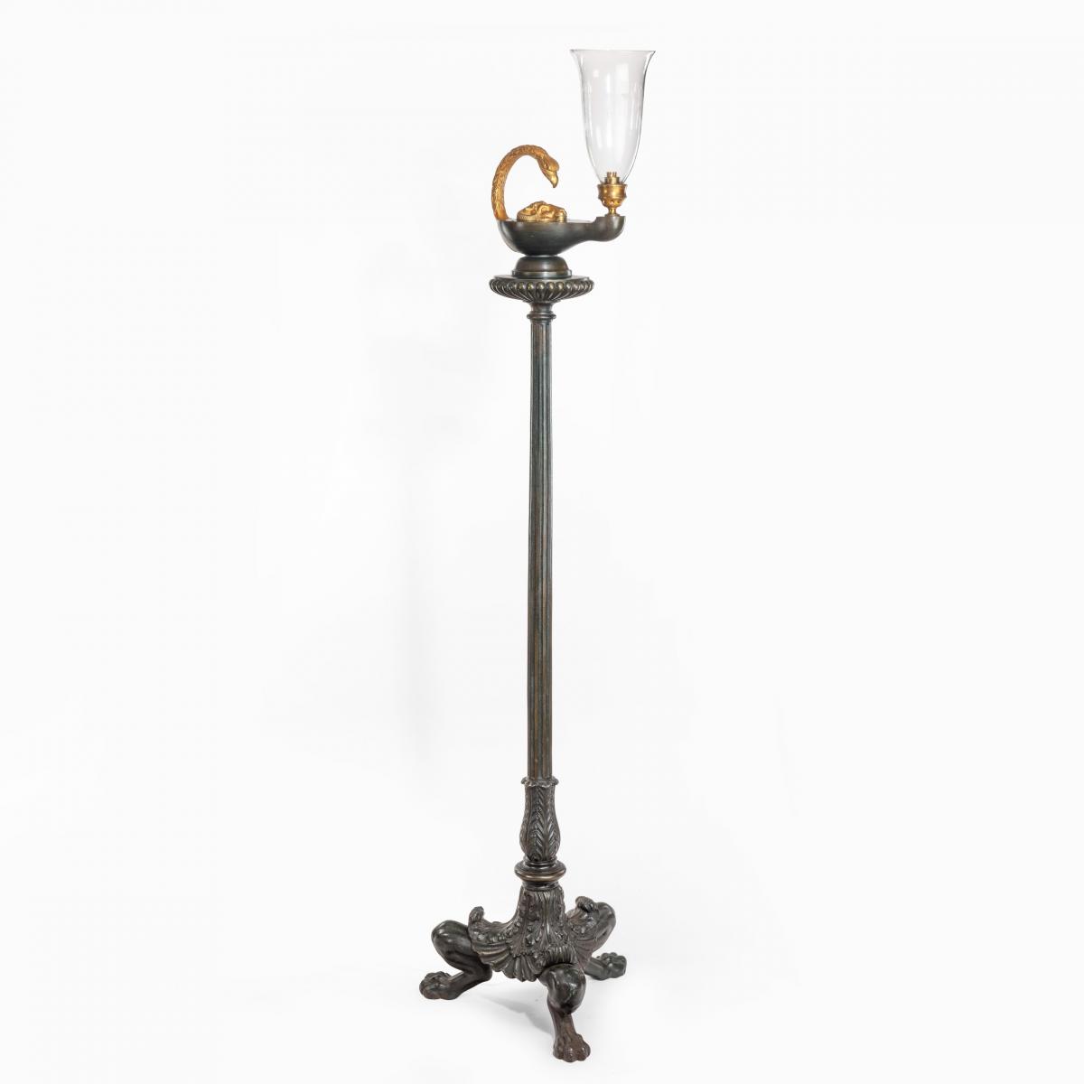 A cast iron colza style standard lamp