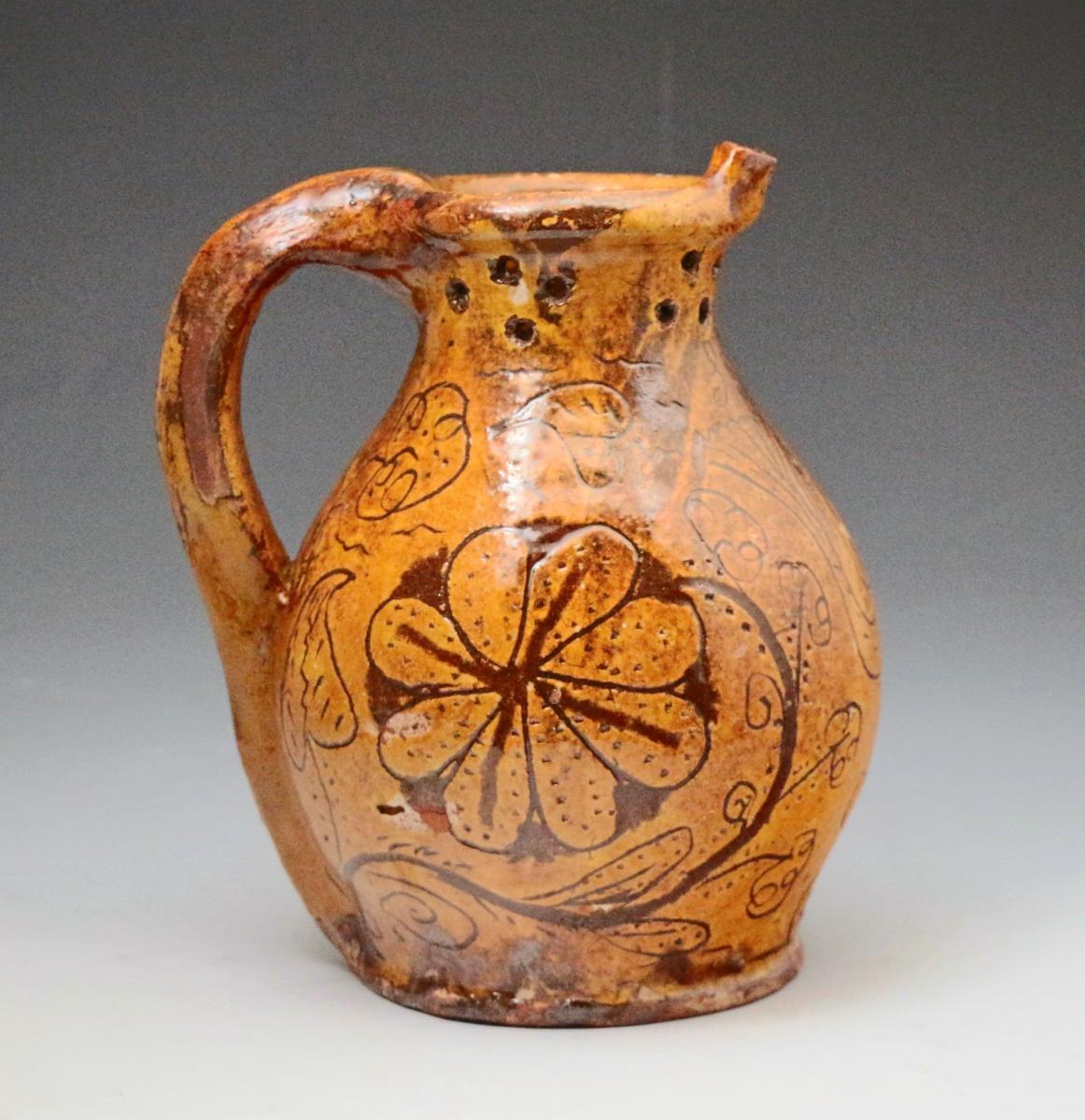 English pottery puzzle jug scraffito decorated and dated 1798 with initials SW