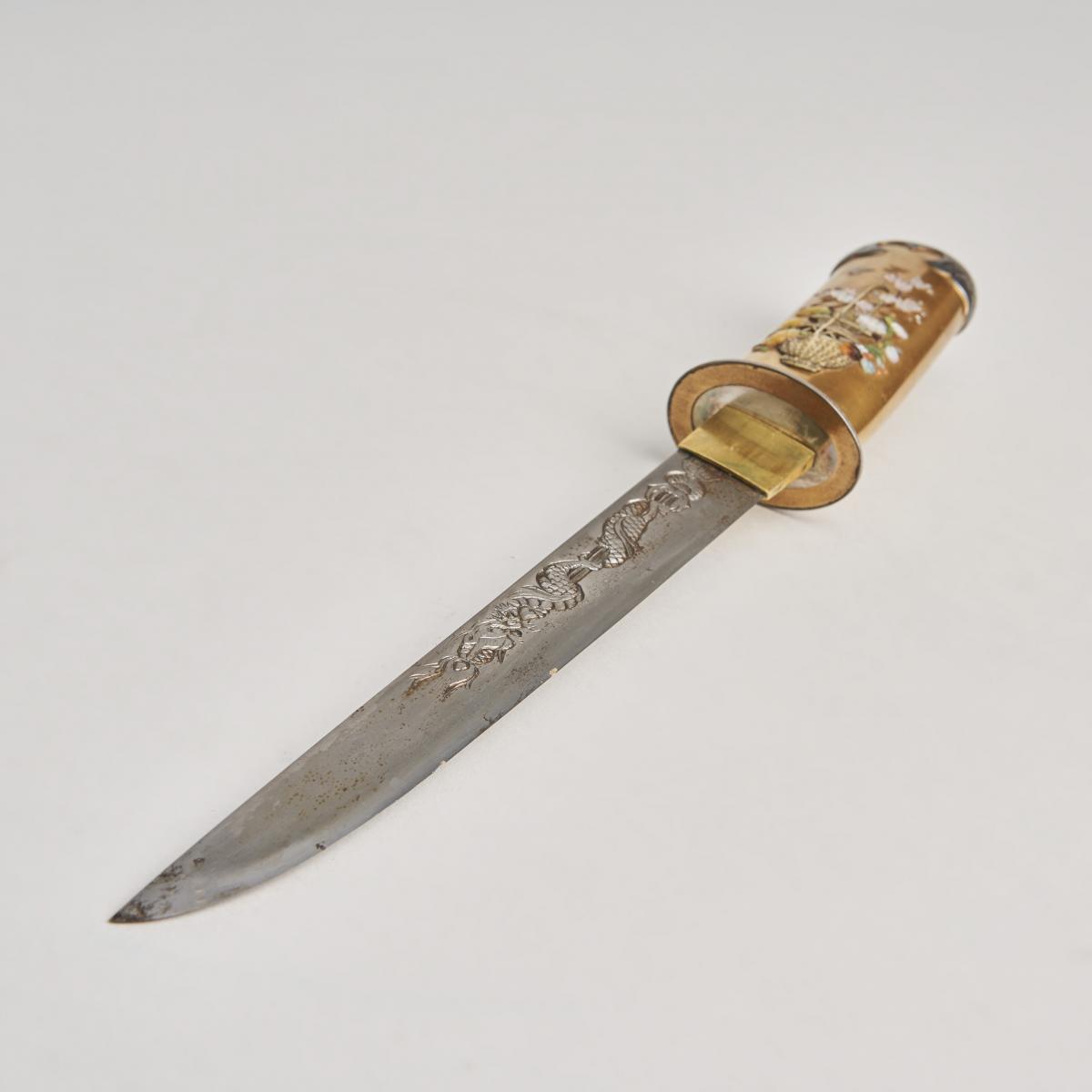 A Japanese Tanto with a gold lacquer sheath and handle inlaid with Shibiyama style decoration.