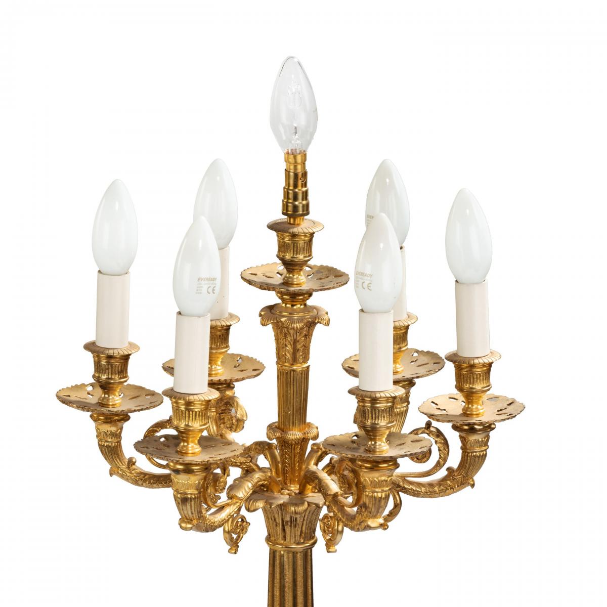 A large pair of onyx and ormolu lamps