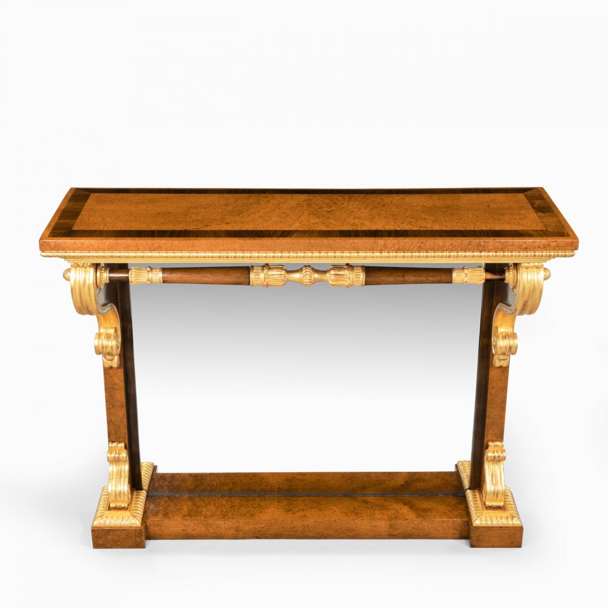 A striking George IV amboyna, rosewood and gilt console table attributed to Morel and Seddon