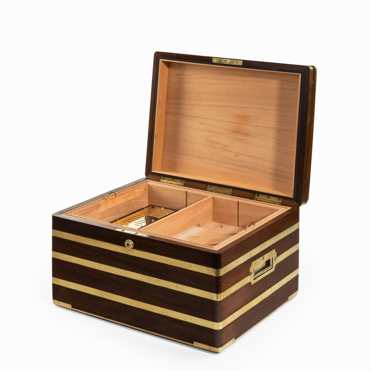 A large brass bound mahogany humidor by J Walker Anderson
