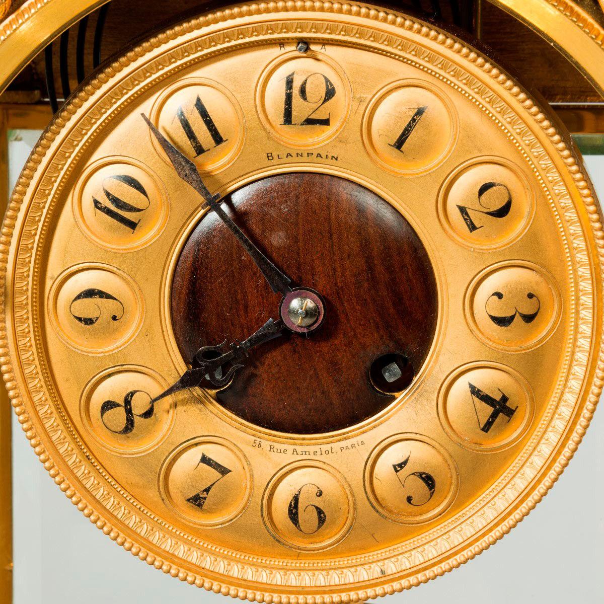 An unusual and superb quality rectangular four glass ormolu mantel clock