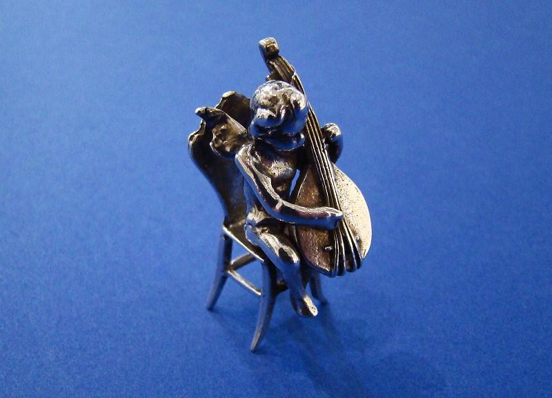 Tiny Edwardian Silver Miniature Cherub playing a Mandolin