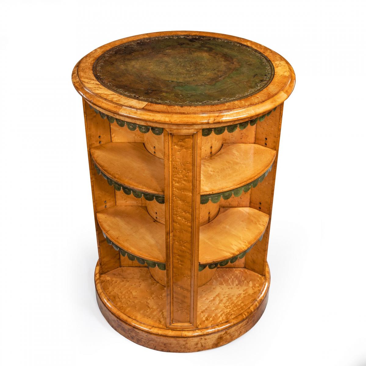 A late Regency bird’s eye-maple cylindrical open bookcase attributed to Gillows