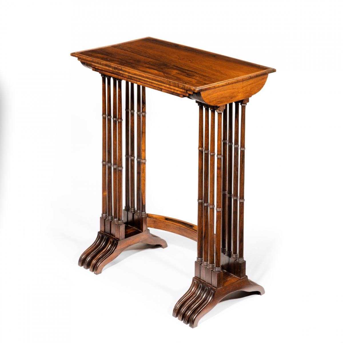 An attractive nest of Regency rosewood quartetto tables