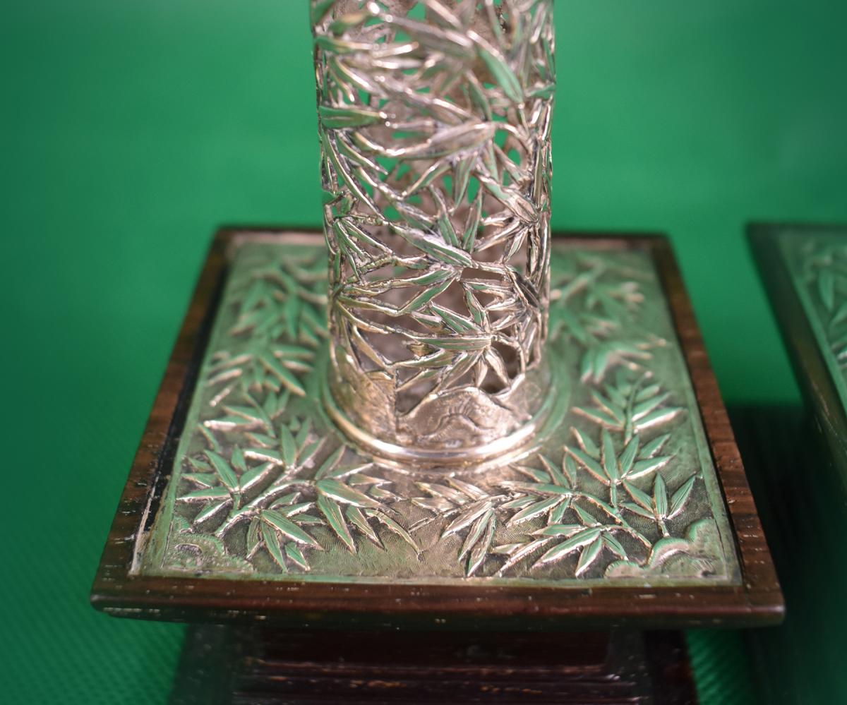 Pair of Chinese silver candle stick holders