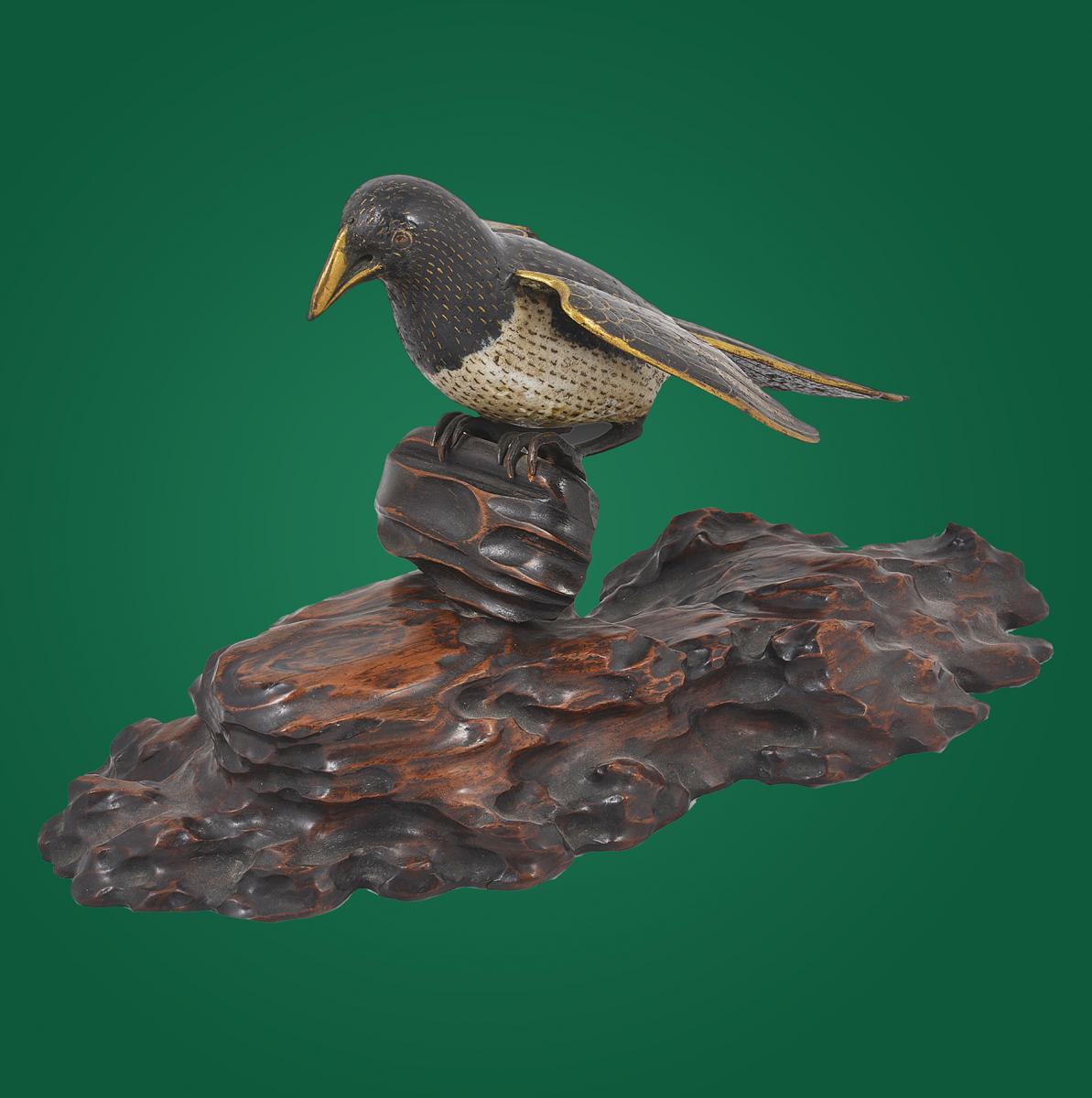 A rotating Clossione magpie perched on a wooden stand