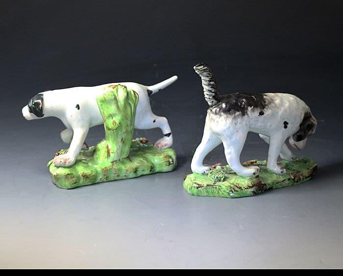Antique Staffordshire pearlware pottery pair of figures of pointer and setter sporting dogs