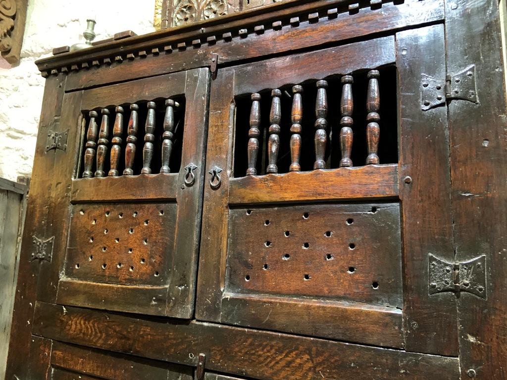 AN UNUSUAL LATE 17TH CENTURY WELSH OAK FOOD CUPBOARD / AUMBRY. CIRCA 1680.