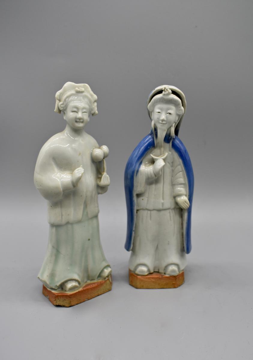 A group of biscuit porcelain figures