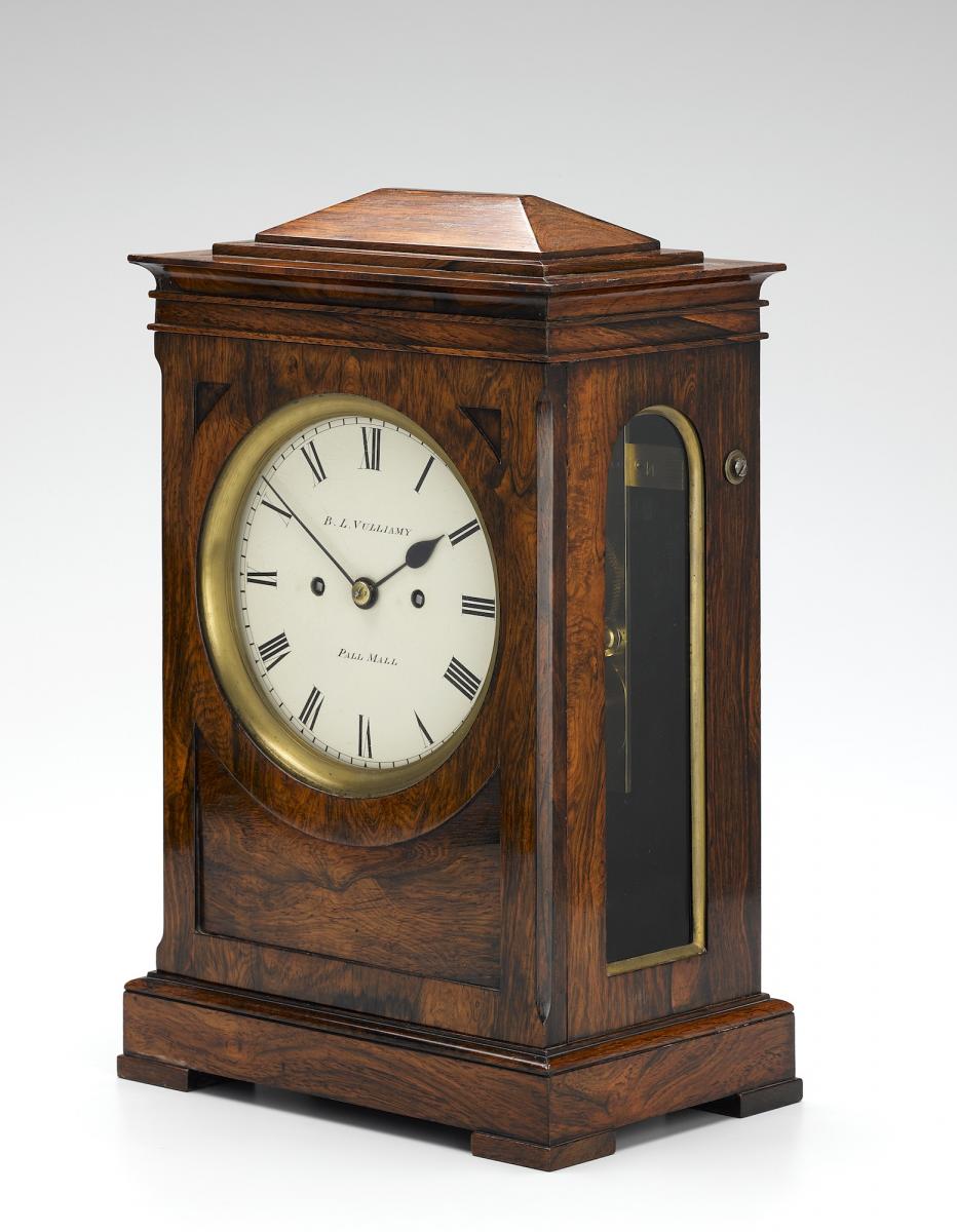 Rosewood and brass mounted table clock by B L Vulliamy, Pall Mall, London.
