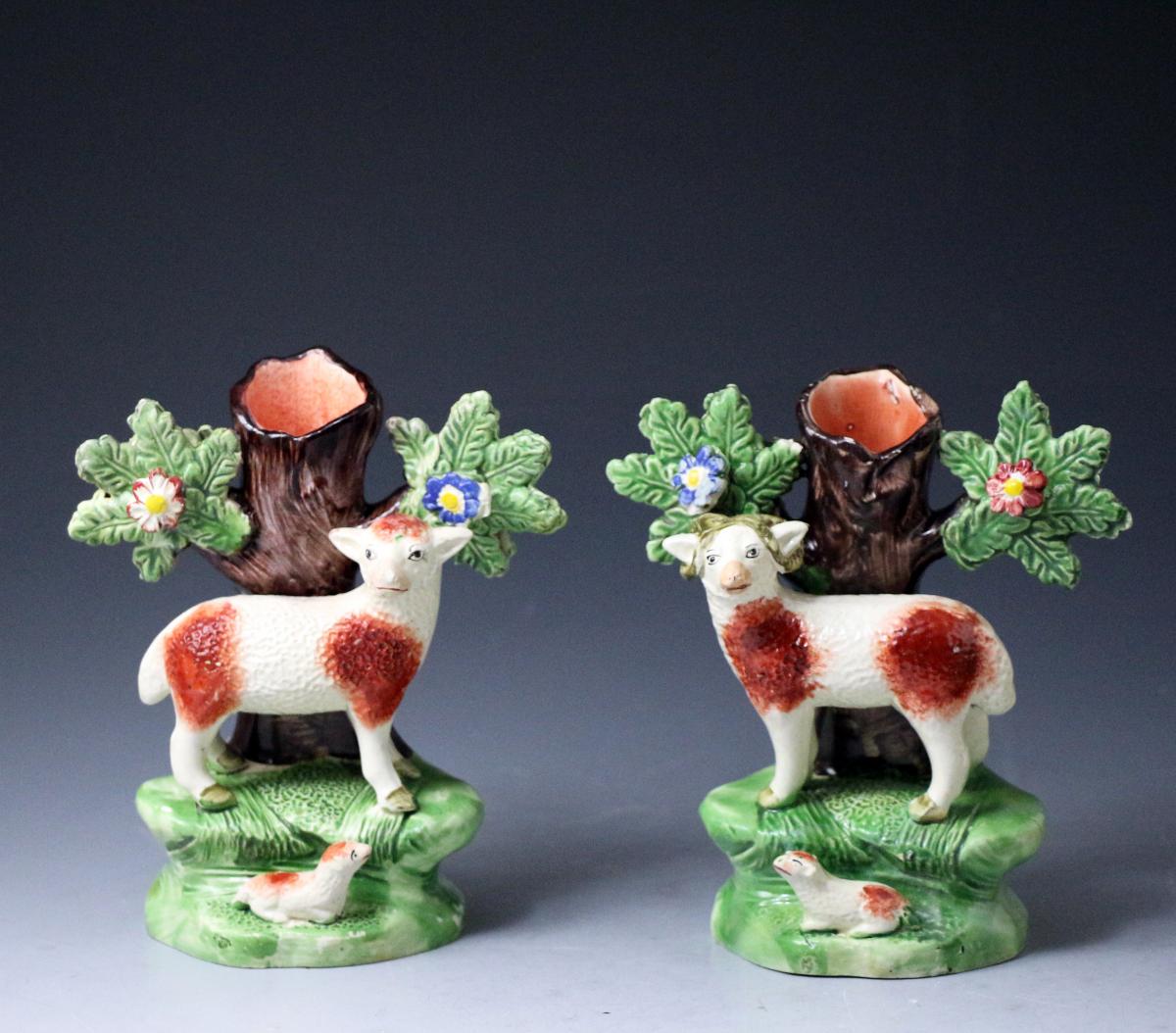 Staffordshire pottery pearlware figures with bocage of a ram and ewe, early 19th century
