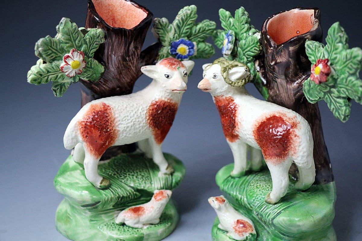 Staffordshire pottery pearlware figures with bocage of a ram and ewe, early 19th century