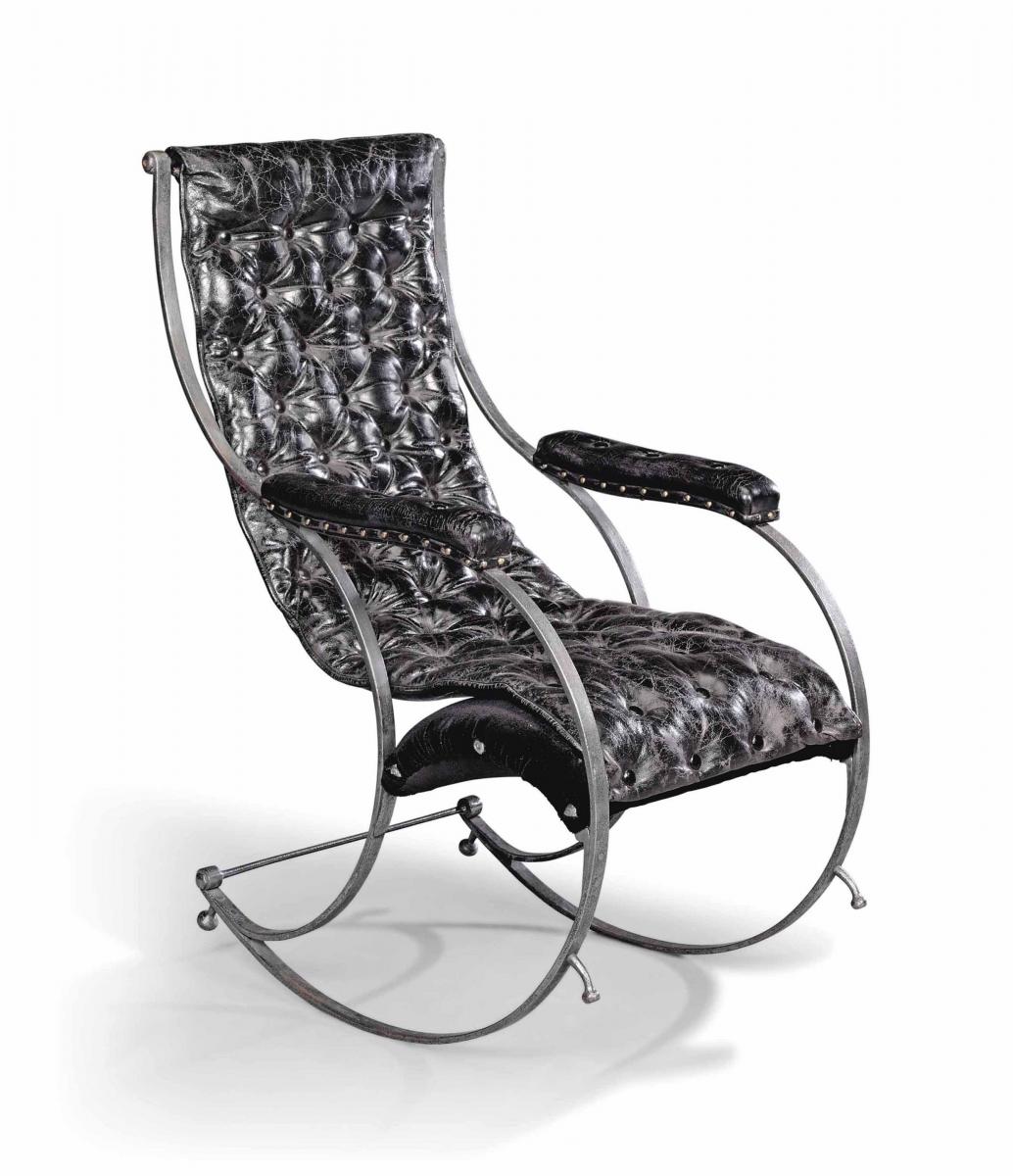 A steel and leather rocking chair in the manner of R.W Winfield