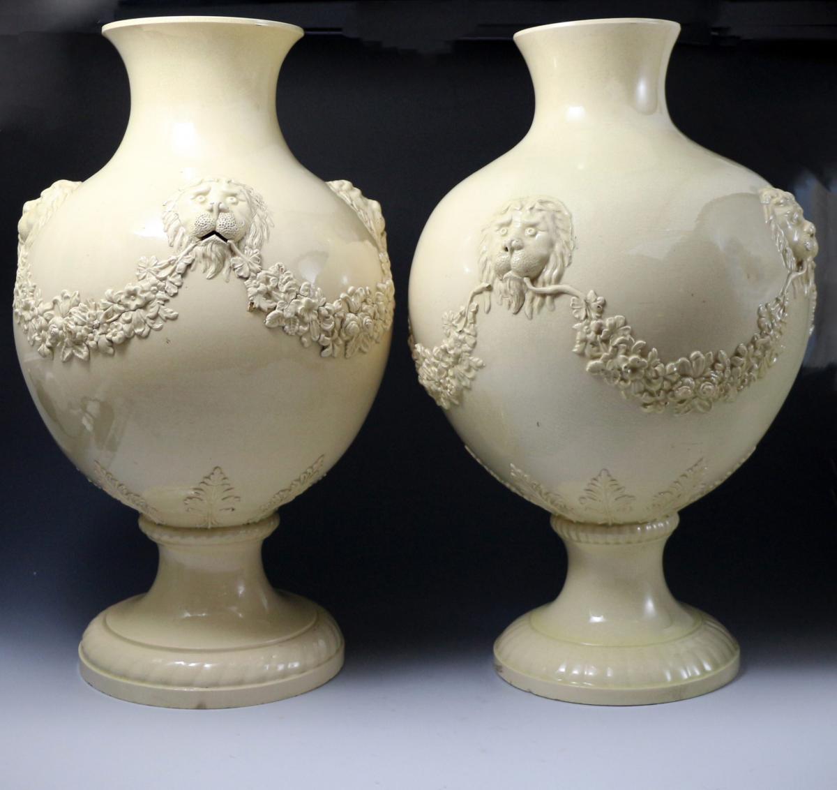 An impressive pair of Wedgwood creamware pottery vases with lion head masks circa 1765