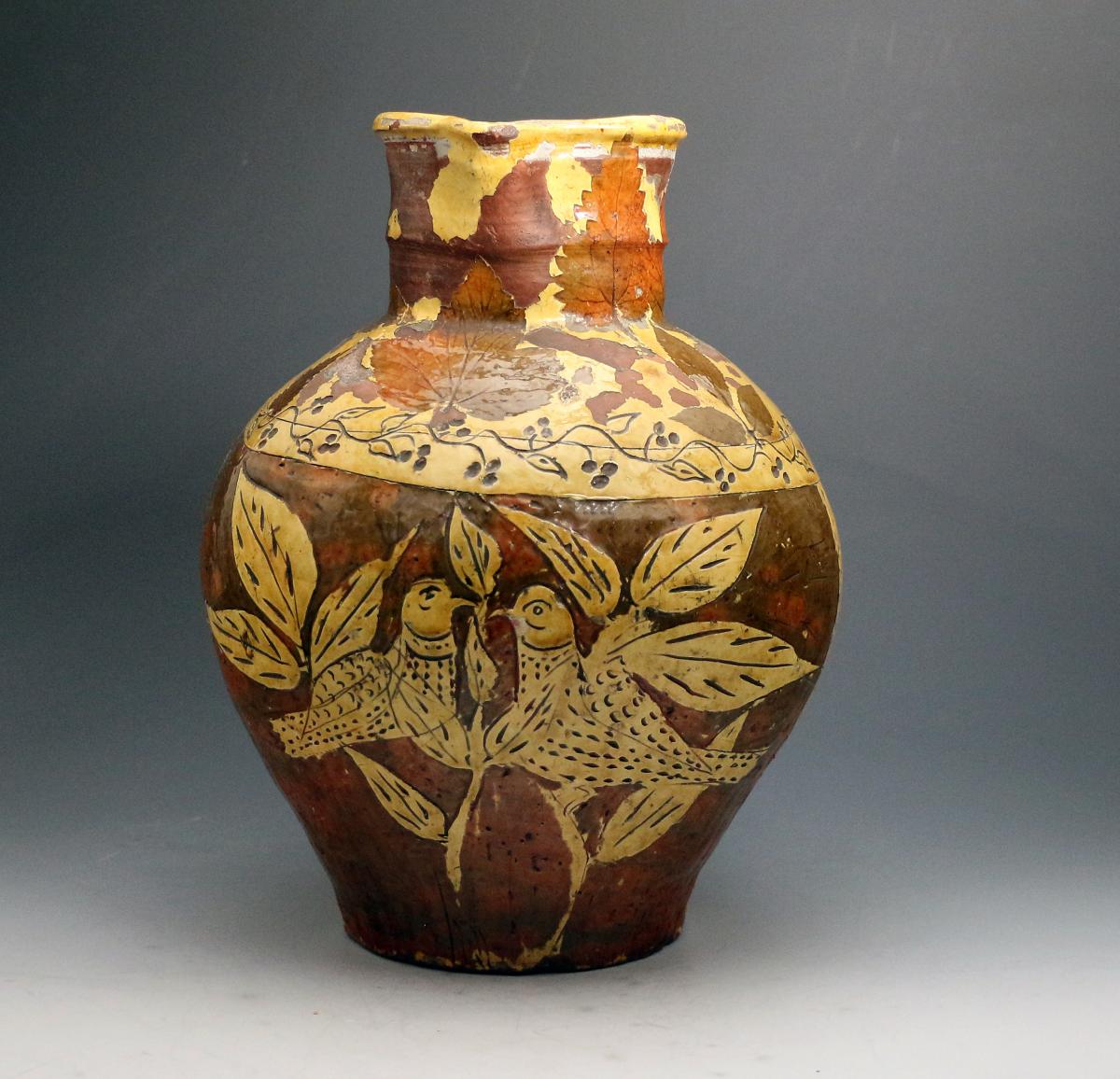 Slipware pottery harvest jug made by George Fishley at the Fremington Devon Pottery