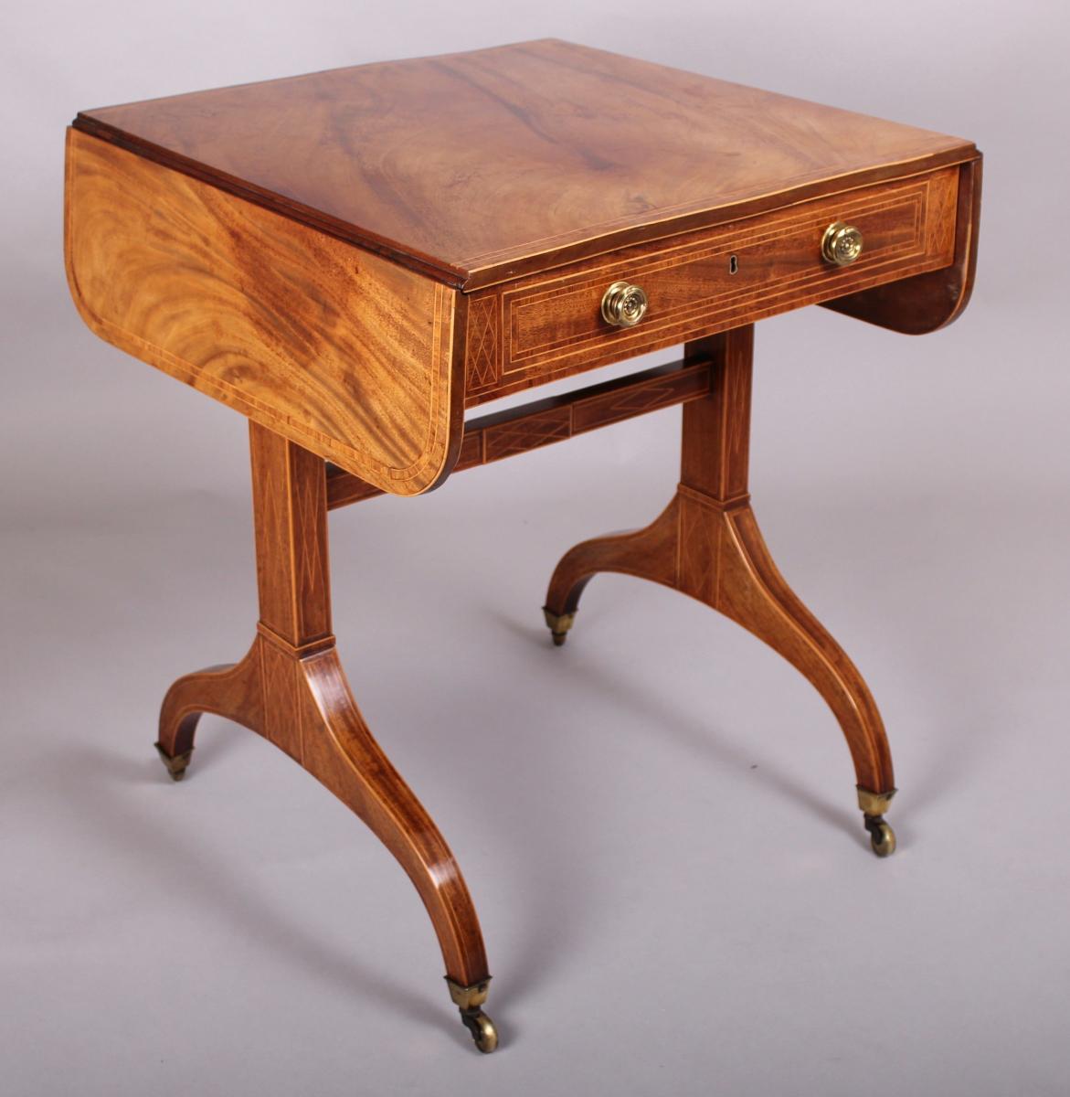 Rare and fine quality George III period mahogany sofa-table of diminutive proportions