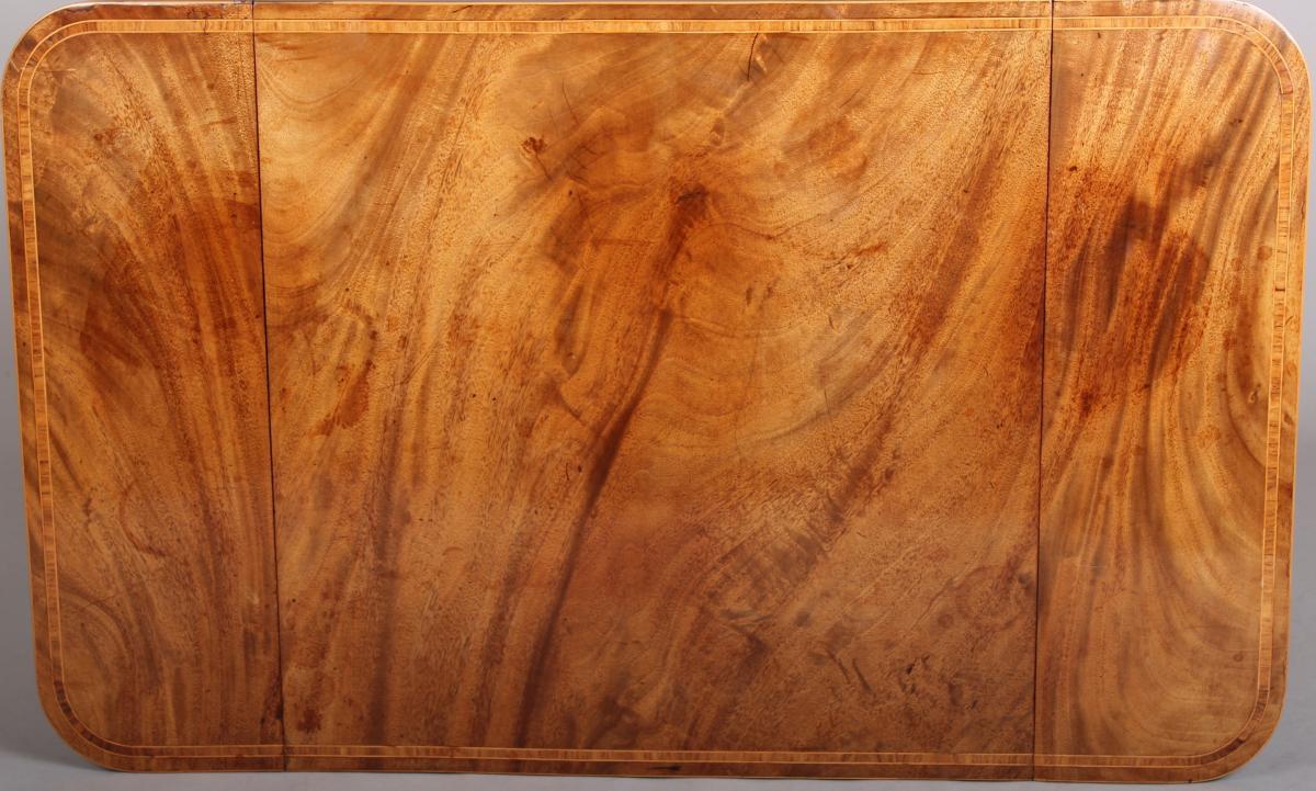 Rare and fine quality George III period mahogany sofa-table of diminutive proportions