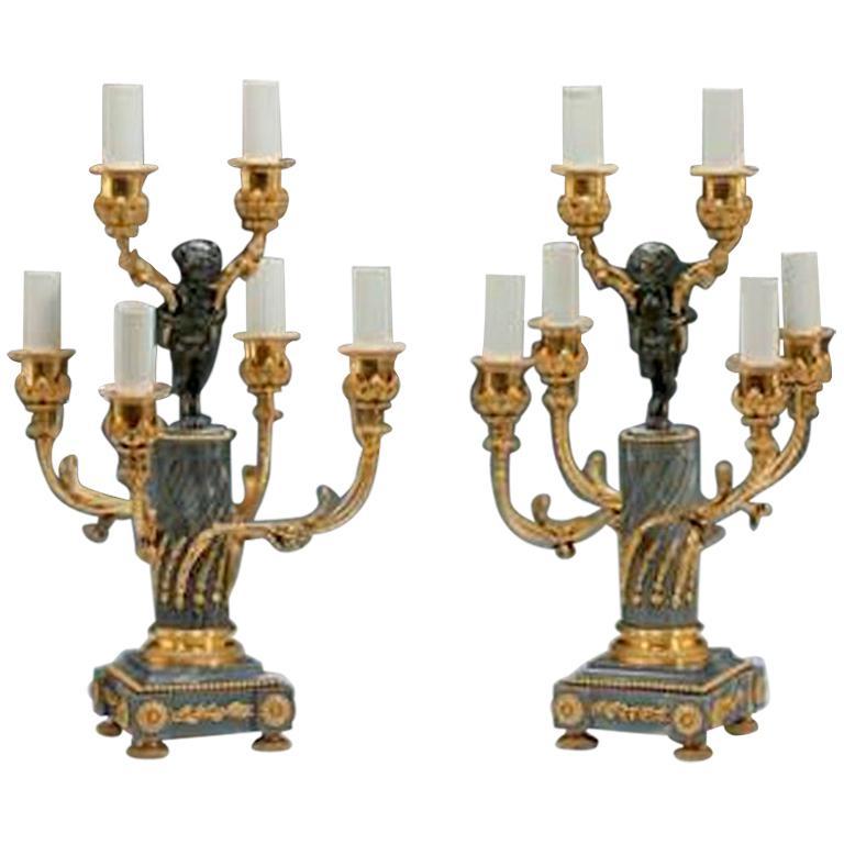 A pair of Napoleon III six-light candelabra