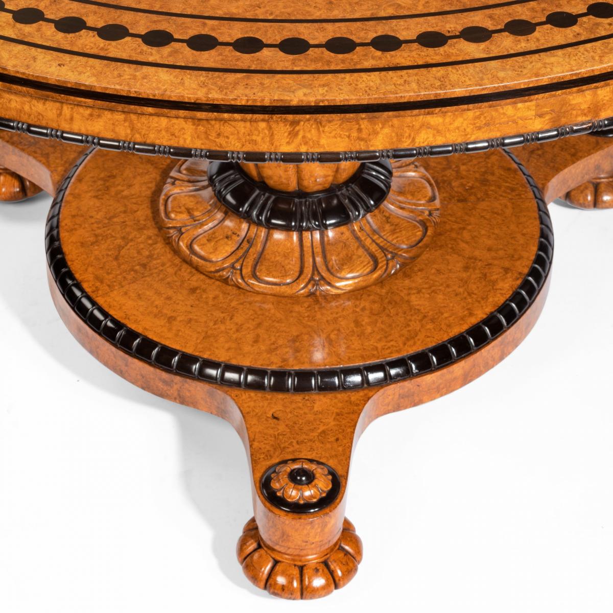 Early Victorian amboyna centre table by Taprell and Holland & Sons