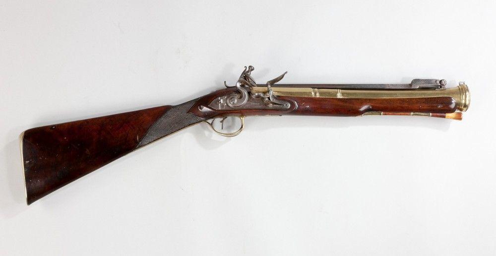 Antique Blunderbus by P Bond, with hinged bayonet and walnut stock