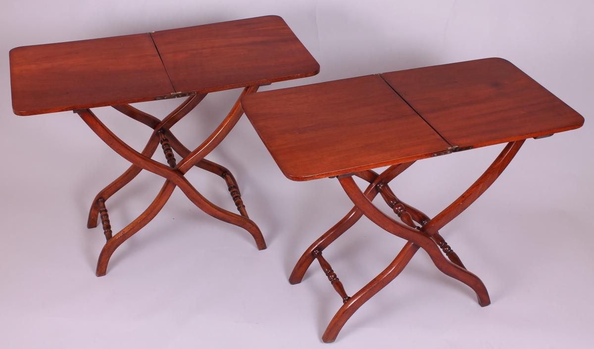 A matched pair of 19th century mahogany ‘coaching’ tables