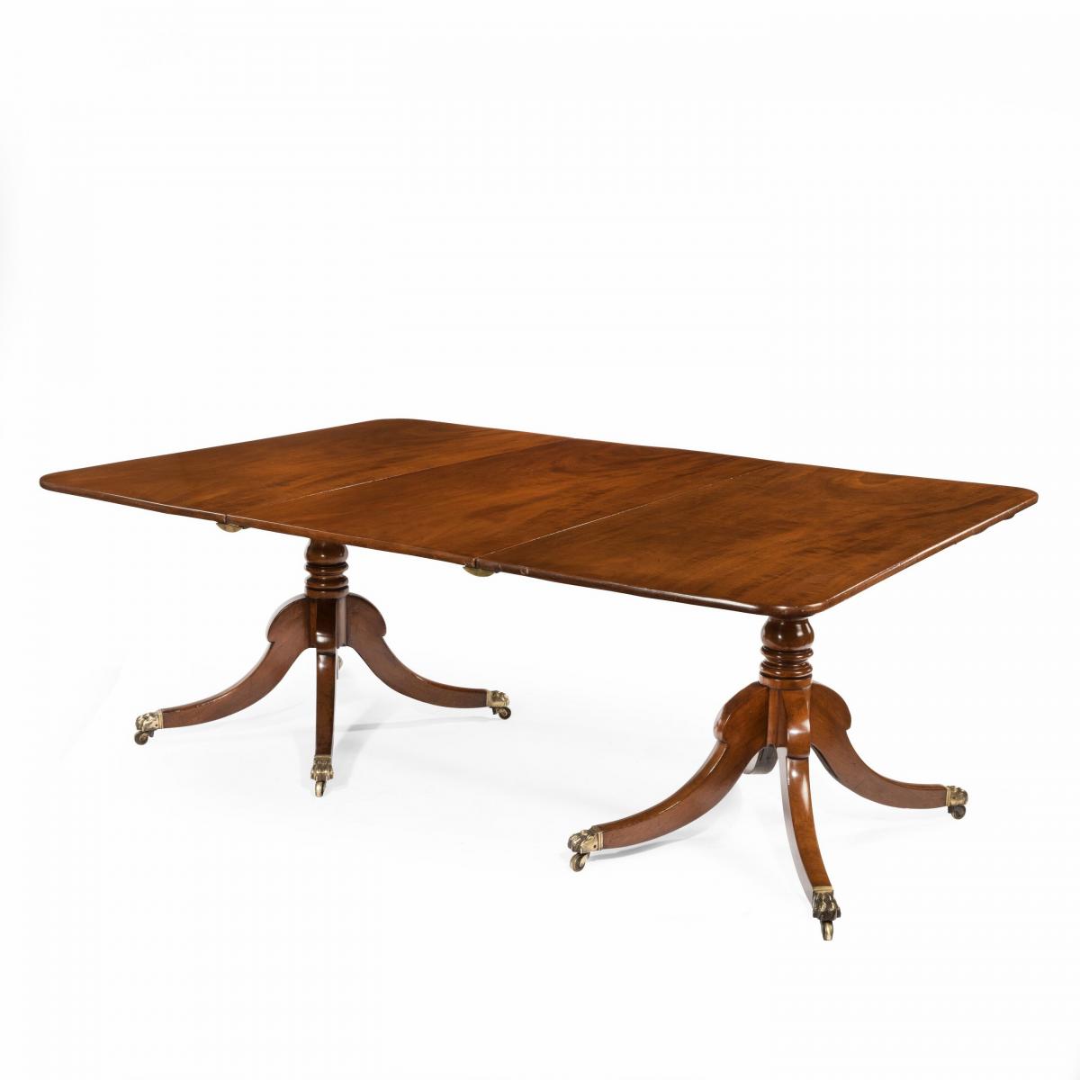 Regency mahogany twin pillar dining table