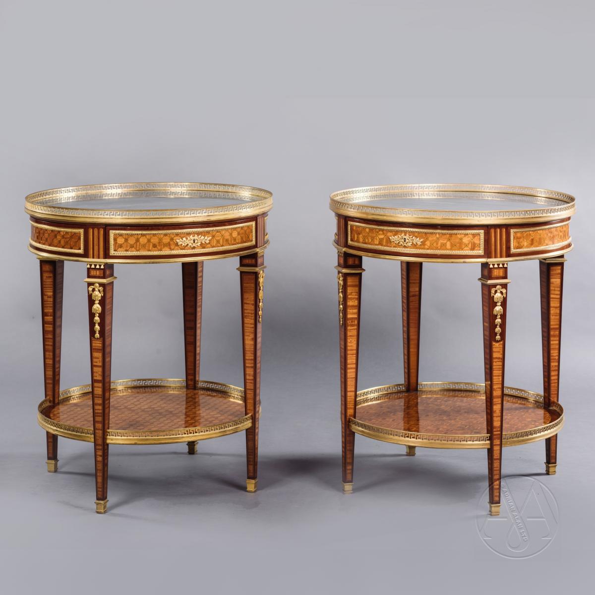 A Rare Pair of Louis XVI Style Gilt-Bronze Mounted Parquetry Gueridons.  French, Circa 1880.